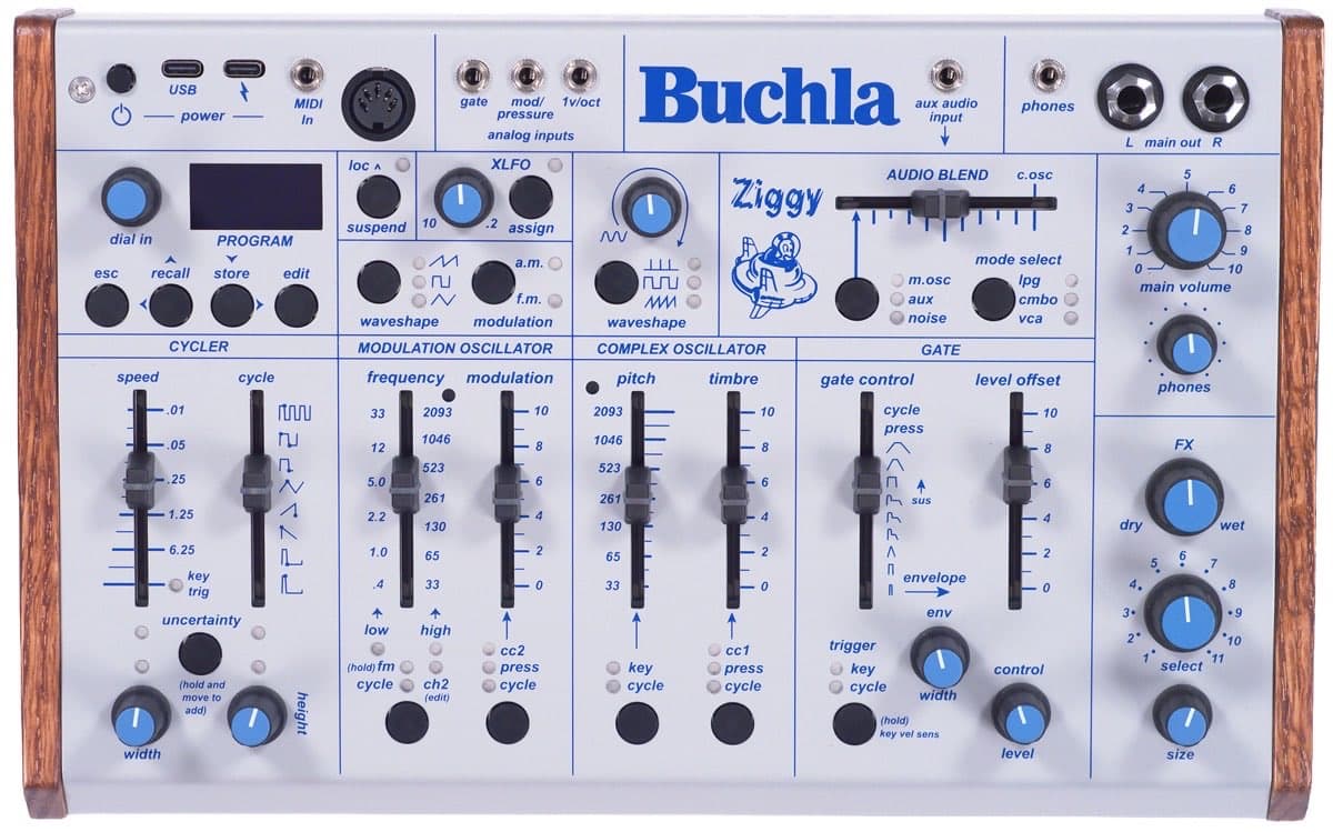 Buchla Ziggy desktop analog synthesizer shown from the front, with sliders, encoder dial, and screen visible on its slanted panel